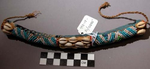 Armband with beadwork and cowrie shells