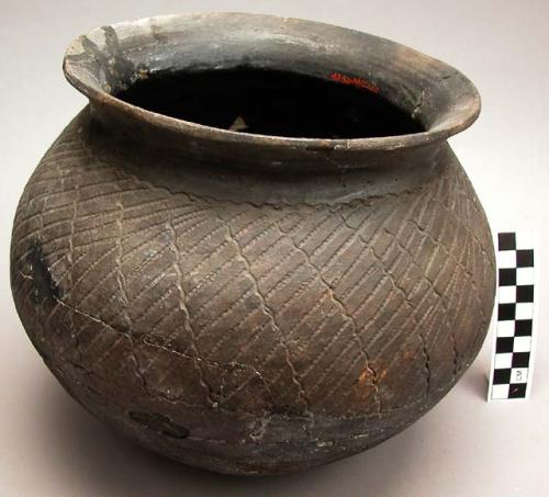 Incised black cooking pot - restored