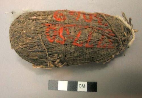 String cone - part of costume belonging to stone idol, no. 50/3054