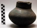 Small pottery washing pot, black, incised decorations, broken rim (kinyabiro)