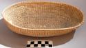 Coiled fibre food dish - oval shape ("ntemere")