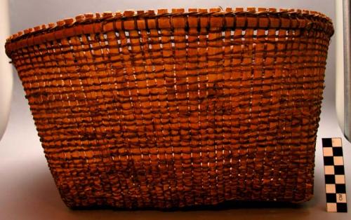 Basket of split bamboo with square bottom.