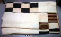 Strip woven textile