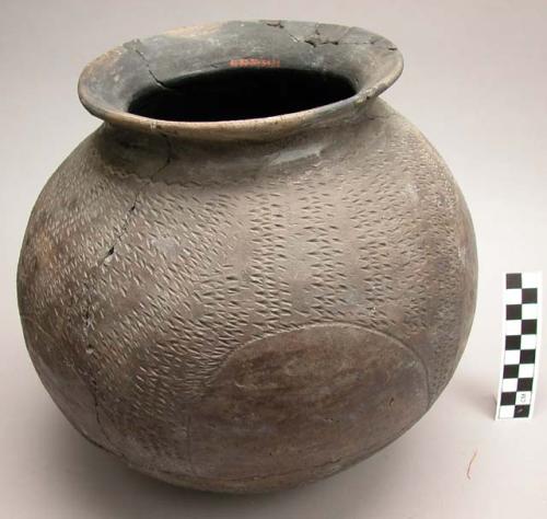 Incised black cooking pot - restored