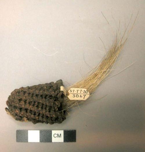 Fiber and hair tuft worn on the head of the stone idol, no. 50/3054