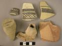 Ceramic body and base sherds, painted ware, some undecorated, mended