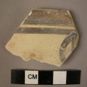 Rim sherd, painted ware. Bowl painted on outside.