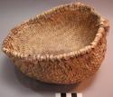 Yucca ring-basket; refuse contained remains of flesh which stained the bottom