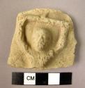 Pottery plaque fragment