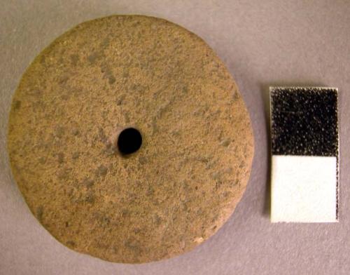 Stone disk with hole in center