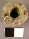 Drilled tufa bead