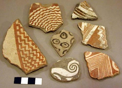 Ceramic rim and body sherds, black on white, red on white, geometric designs