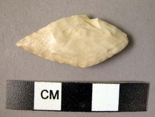 Flint diamond-shaped bifacially pressure worked point; heavily worn