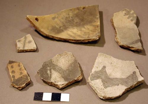 Black on white potsherds