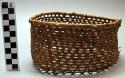 Small basket, open hexagonal weave, oval shaped, mbombozalo