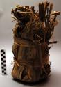 Braided tobacco in fibre container, mbagi