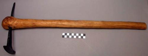 Axe, wooden club-shaped handle with t-shaped iron blade, loka