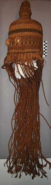 Circumcision mask made of woven rope with fur between eye holes