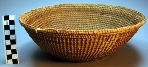 Basketry bowl, vine wrapped bark strips, flat base, spaces in weave, dk band