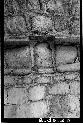 Carved capstone in wall, Group 1; Structure 4