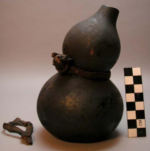 Gourd vessel with leather handle. Urusaze