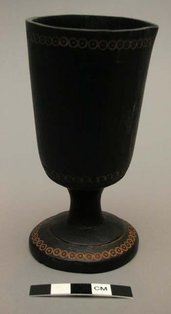 Stemmed lip goblet of native wood