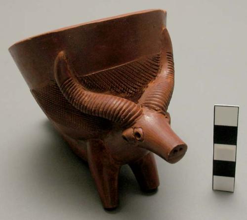 Red clay pipe bowls, decorated with animal figures - 4 antelope(?) 1 water buffa