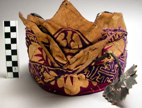 Cloth hat of a kebijar dancer (oedoeng) - usually folded; adorned with+