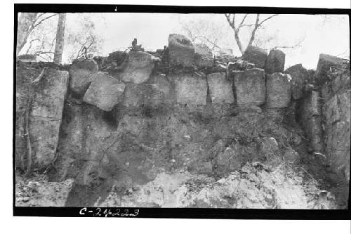 NE colonnade - part of fallen arch at E end showing arch stones down, looking N