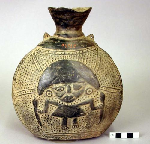 Ceramic bottle, incised human & geometric design, 2 perforated lug handles