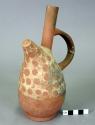 Small necked vase with handle