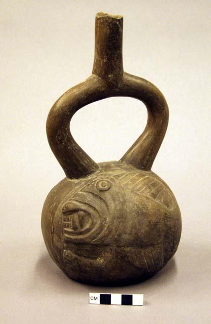 Stirrup spout jar- fish demon