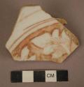 Red and white potsherd - floral design