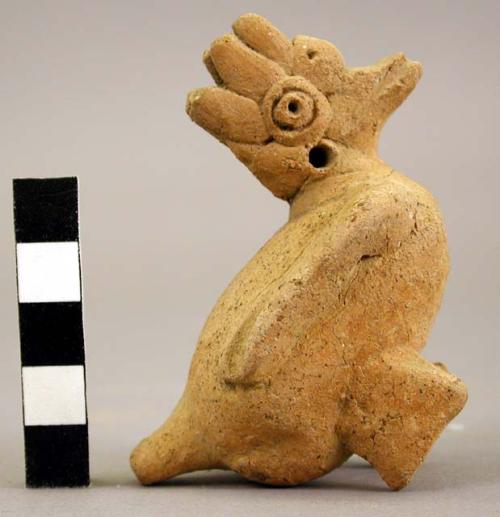 Buff pottery bird figurine