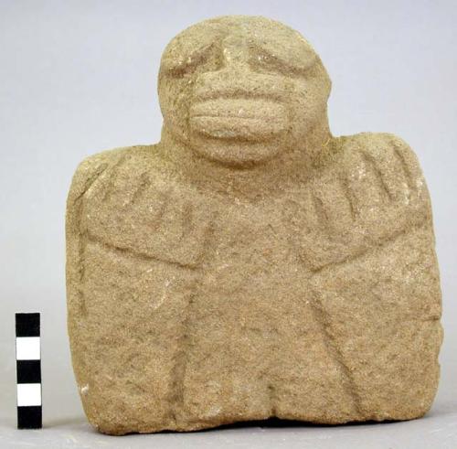 Head and torso of stone figure