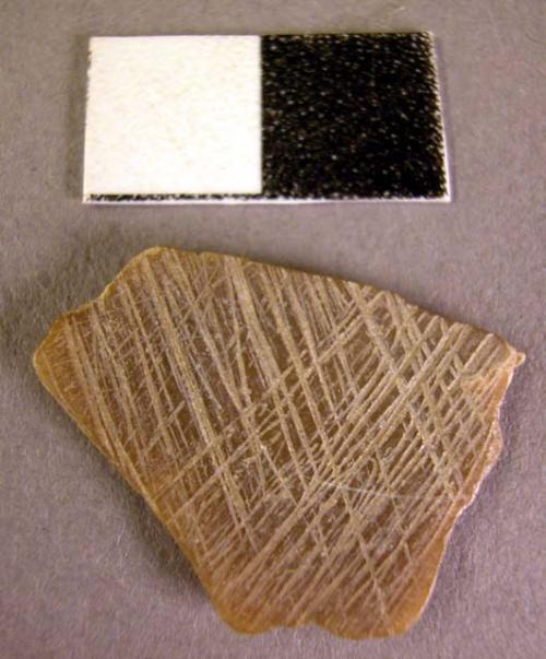 Stone, ground stone, worked soapstone fragment, incised on both sides