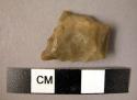 Flint irregular trapezoidal flake, one angle pressure retouched into point, poss