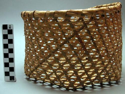 Round basket, open hexagonal weave, greenish fibre, diameter 8.75", height 6.25"