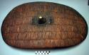 Shield - oval shape, fibre coiled around long strips of wood ("ngabo")