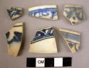 7 rim potsherds - blue and white glaze