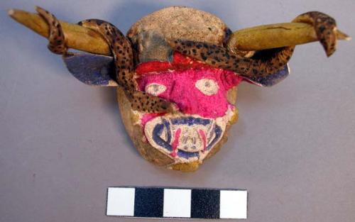 Miniature plaster mask - upper part grotesque face cerise, rest green +