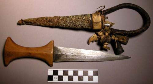 Knife sheath and two small instruments