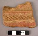 Potsherd - indented applique, red ware