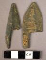 2 fragments of 2 ground slate projectile points with long barbs