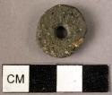 Small circular stone spindle whorl