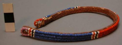 Double armlet (delamai) - beaded on sewed on rawhide.