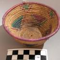 Small basket-coiled weave, triangular pattern in purple & green (mbombo)