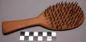 Wooden hair brush of old woman's hair