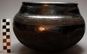 Pottery vessel glazed with "liki"