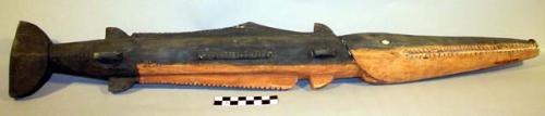 Black and red wooden shark with shell inlaid eyes, 73 x 10 x 6 cm.